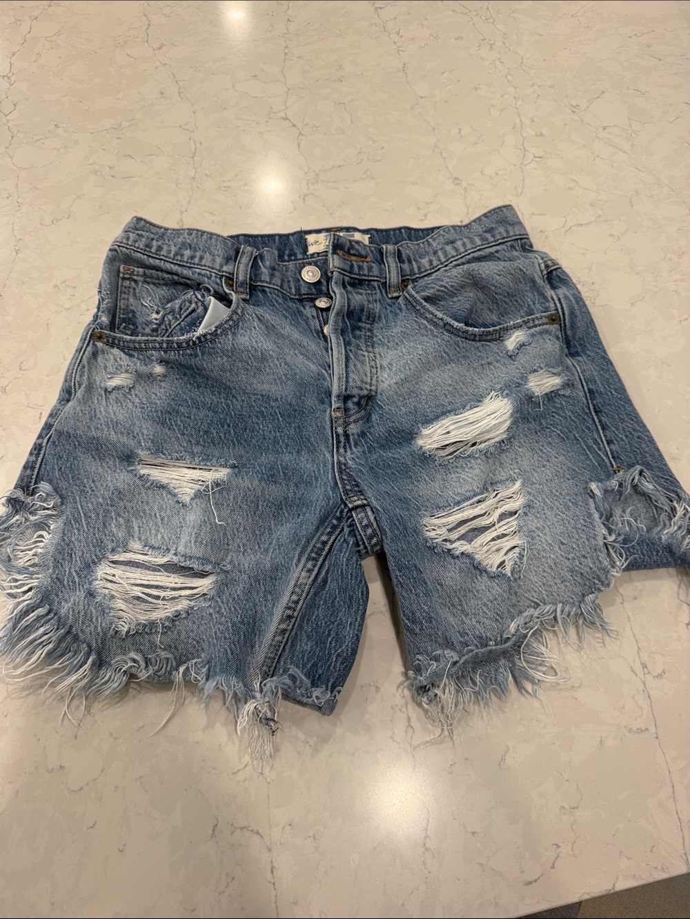 We the free distressed shorts